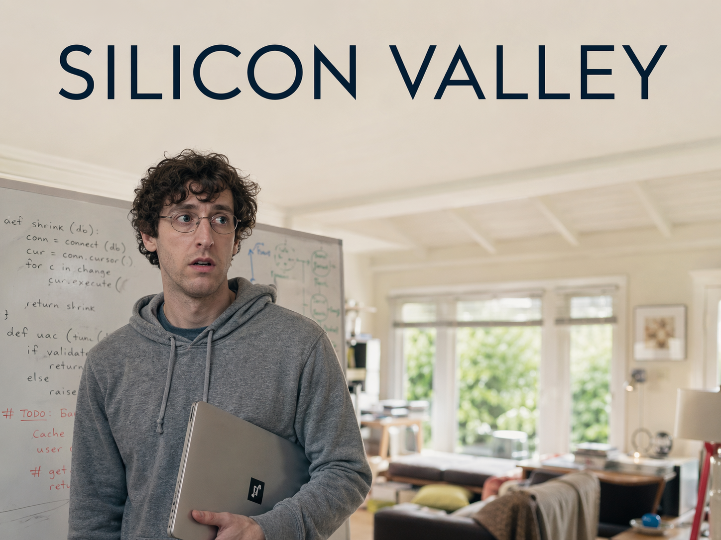 Thomas Middleditch as Richard Hendricks in a grey hoodie holding a laptop in a Palo Alto hacker house with a whiteboard of scrawled code behind him, Silicon Valley title overlay.