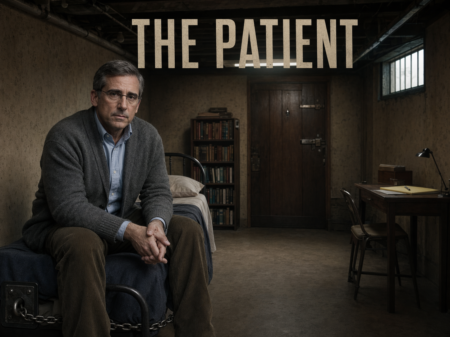 Steve Carell as Dr Alan Strauss in a grey cardigan on the edge of a bed in a dim basement bedroom with a chain around his ankle and a barred window overhead, The Patient title overlay.
