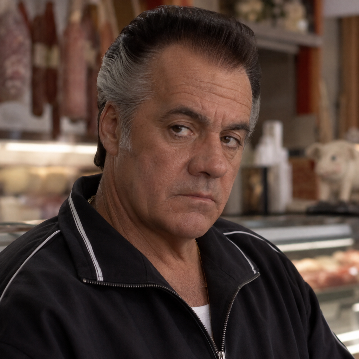 Tony Sirico as Paulie Gualtieri in The Sopranos, in a head-and-shoulders character portrait.